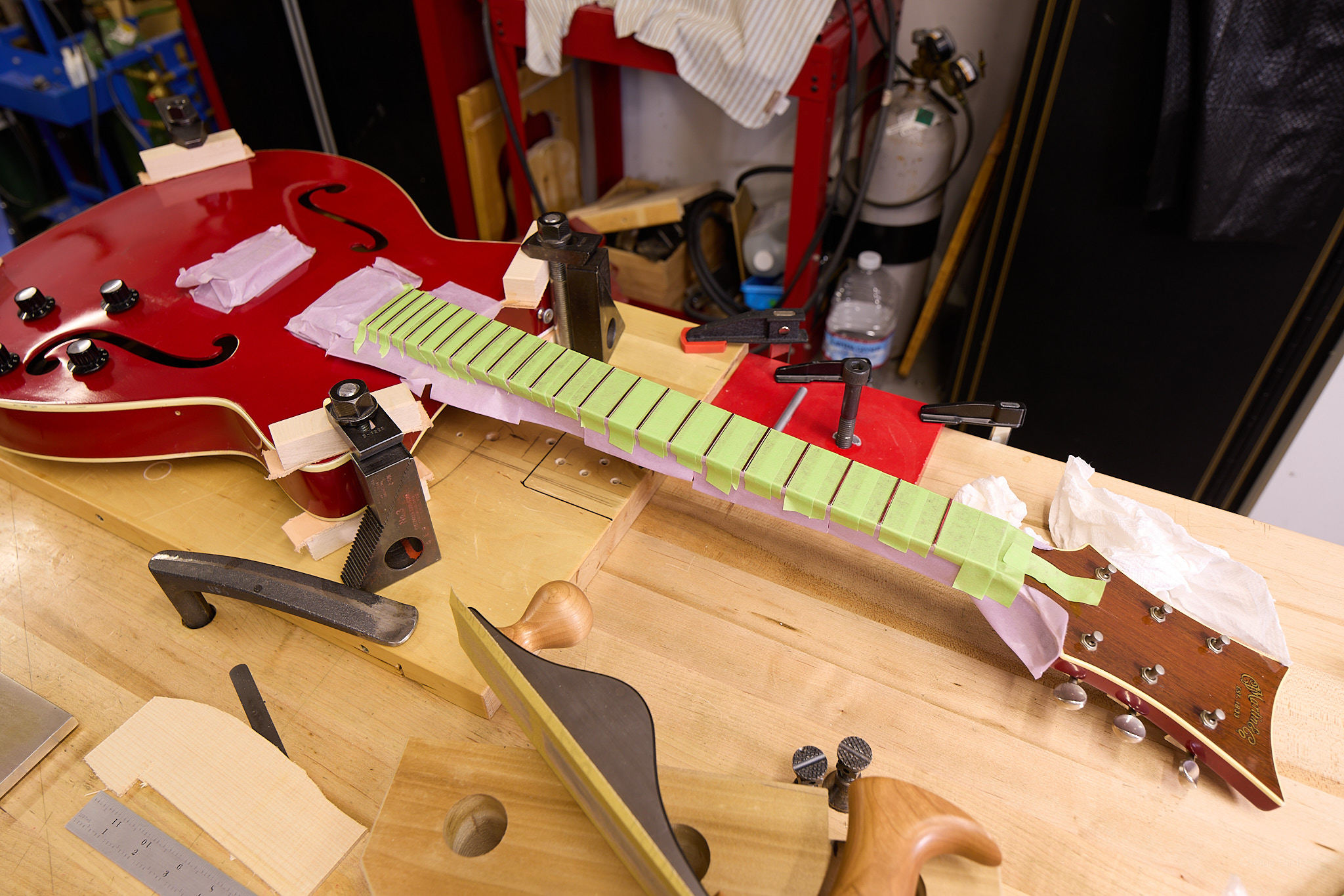 Taped off fretboard